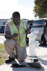 2 Echologics Field Technician Prepares To Measure The Structural Integrity Of A Water Distribution Main Using E Pulse&circledR; Condition Assessment
