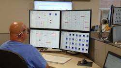 operator%20and%20four%20monitors operator%20and%20four%20monitors