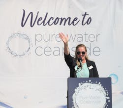 City of Oceanside Water Utilities Director Cari Dale waves during the grand opening of Pure Water Oceanside, an advanced treatment facility in California.