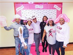 Dr. Majid Kahn, middle commemorates breast cancer awareness month with fellow coworkers at the Water Resource Recovery Facility. Dr. Majid Kahn, middle commemorates breast cancer awareness month with fellow coworkers at the Water Resource Recovery Facility.