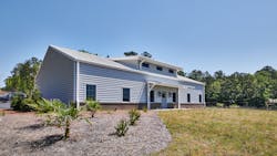 With its location on the bank of Lake Greenwood, designers developed architecture to make the raw water intake look like another house in the lake-side community. With its location on the bank of Lake Greenwood, designers developed architecture to make the raw water intake look like another house in the lake-side community.