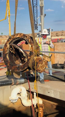 An old valve is removed during the construction of the Pyramid Peak Water Treatment Plant. An old valve is removed during the construction of the Pyramid Peak Water Treatment Plant.