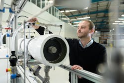 Tim Naughton, co-founder and chief technical officer of Salinity Solutions, demonstrates the company's water treatment technology. Tim Naughton, co-founder and chief technical officer of Salinity Solutions, demonstrates the company's water treatment technology.