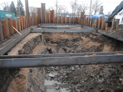 Workers excavate inside sheet piling for the regional pump station. Workers excavate inside sheet piling for the regional pump station.