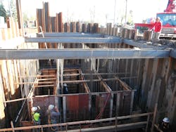 Workers form the walls of the regional pump station.