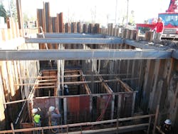 Workers form the walls of the regional pump station. Workers form the walls of the regional pump station.