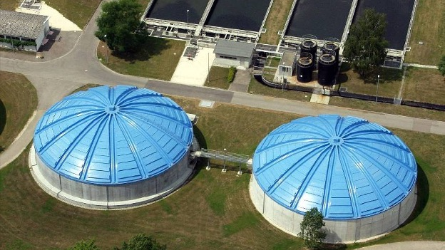 A fiberglass-reinforced plastic dome covering system spanning 120 feet.