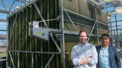 The algae reactor was developed by retired MWRD Assistant Director of Monitoring and Research Tom Kunetz (on the left) and MWRD Principal Environmental Scientist Kuldip Kumar with partners.