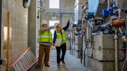 Bryan Buchanan, left, conducts a walk through of the Pleasant Grove WWTP in Roseville, California. Bryan Buchanan, left, conducts a walk through of the Pleasant Grove WWTP in Roseville, California.