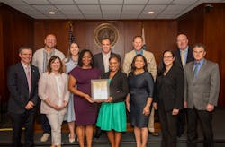 MWRD commissioners and executive staff display a plaque commemorating a United States patent the agency earned for inventing technology with partners from the Iowa State University Research Foundation, to remove dissolved solids from wastewater through an algae recovery system. MWRD commissioners and executive staff display a plaque commemorating a United States patent the agency earned for inventing technology with partners from the Iowa State University Research Foundation, to remove dissolved solids from wastewater through an algae recovery system.