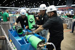 n a race against time and a competition of skill and precision, MWRD Carpenter Leadman Dave Garza (from left), Principal Engineer Lynn Kohlhaas, Associate Civil Engineer Thomas Sinickas, and Pipefitter Foreman Andre Almaraz compete in the Collections Event at the Operations Challenge. n a race against time and a competition of skill and precision, MWRD Carpenter Leadman Dave Garza (from left), Principal Engineer Lynn Kohlhaas, Associate Civil Engineer Thomas Sinickas, and Pipefitter Foreman Andre Almaraz compete in the Collections Event at the Operations Challenge.
