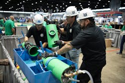 n a race against time and a competition of skill and precision, MWRD Carpenter Leadman Dave Garza (from left), Principal Engineer Lynn Kohlhaas, Associate Civil Engineer Thomas Sinickas, and Pipefitter Foreman Andre Almaraz compete in the Collections Event at the Operations Challenge.