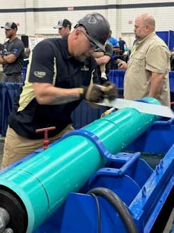 A competitor saws a pipe during the Operations Challenge Invitational in South Carolina during the Brawl at the Beach. A competitor saws a pipe during the Operations Challenge Invitational in South Carolina during the Brawl at the Beach.