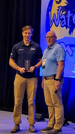 Tyler Waterhouse accepts the Water Environment Association of South Carolina Operator of the Year award during the South Carolina Environmental Conference.