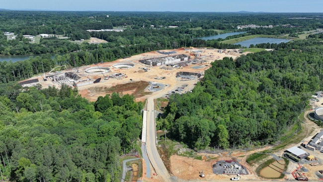 Charlotte Water’s largest project, the Stowe Regional Water Resource Facility, sits on a peninsula between Long Creek and the Catawba River. The Mount Holly Pump Station is visible on the opposite bank, which will send flows from Gaston County deep under the river to the Stowe RWRRF for treatment. Photo Credit: Strauss Studios