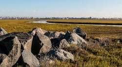 Boulders on the Tijuana River National Estuarine Research Reserve in the morning light in San Diego, California. Boulders on the Tijuana River National Estuarine Research Reserve in the morning light in San Diego, California.