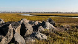 Boulders on the Tijuana River National Estuarine Research Reserve in the morning light in San Diego, California. Boulders on the Tijuana River National Estuarine Research Reserve in the morning light in San Diego, California.