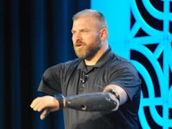 Travis Mills, retired U.S. Army staff sergeant, author and founder of the Travis Mills Foundation, speaking at WEFTEC 2025 in Chicago about his struggles as a quadruple amputee and how he has adapted to change. Travis Mills, retired U.S. Army staff sergeant, author and founder of the Travis Mills Foundation, speaking at WEFTEC 2025 in Chicago about his struggles as a quadruple amputee and how he has adapted to change.