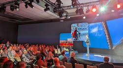 Bentley Systems CEO Nicholas Cumins speaks to a crowd of International press. Bentley Systems CEO Nicholas Cumins speaks to a crowd of International press.