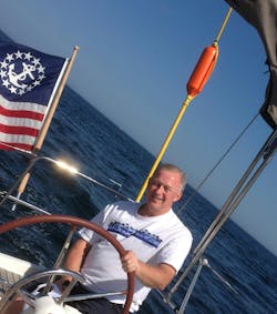 Alan enjoying time out on the water sailing. Alan enjoying time out on the water sailing.