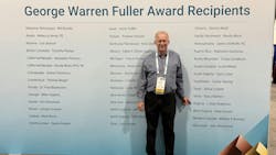 Alan Roberson poses in front of a sign that features AWWA George Warren Fuller Award recipients, which he recieved for the state of Virgina. Alan Roberson poses in front of a sign that features AWWA George Warren Fuller Award recipients, which he recieved for the state of Virgina.