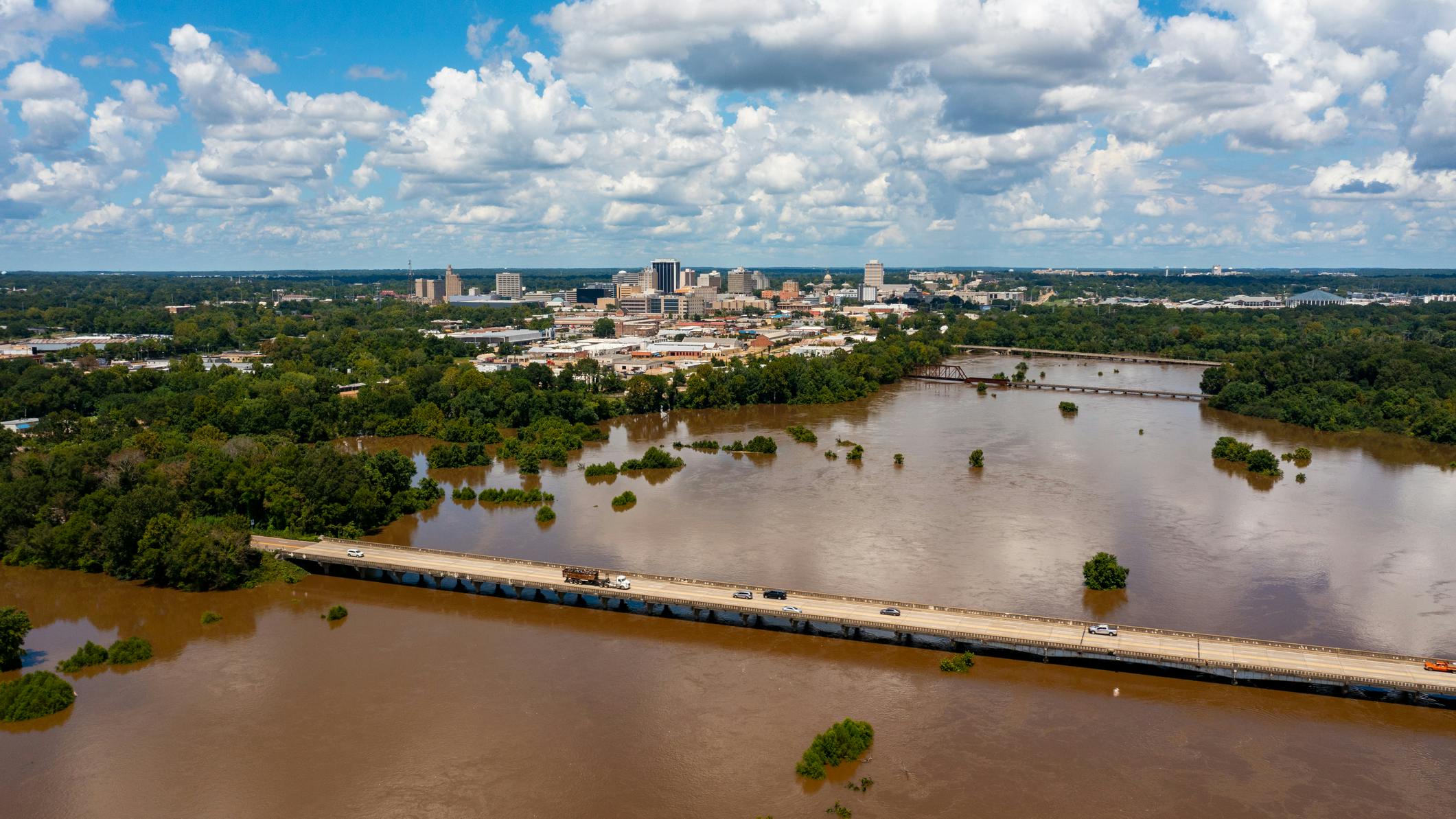 Jackson, MS Skyline with flooding Pearl River in the foreground in August 2022