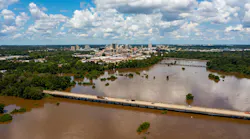 Jackson, MS Skyline with flooding Pearl River in the foreground in August 2022
