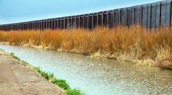 The US border fence to Mexico at El Paso The US border fence to Mexico at El Paso