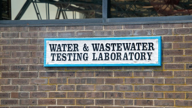 Sign at a water testing and wastewater laboratory