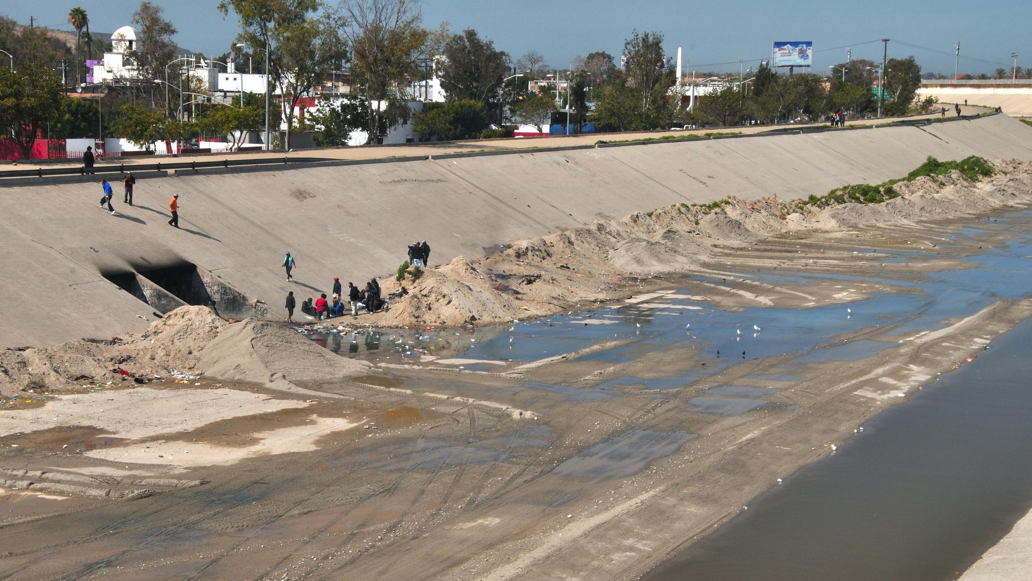 Tijuana River floodway and homeless camp in Mexico