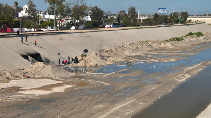 Tijuana River floodway and homeless camp in Mexico