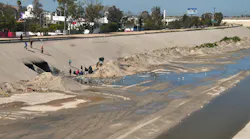 Tijuana River floodway and homeless camp in Mexico