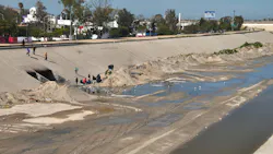Tijuana River floodway and homeless camp in Mexico