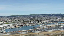 An aerial panoramic view of ship building factories, car manufacturing plants and oil refineries, in Richmond, California